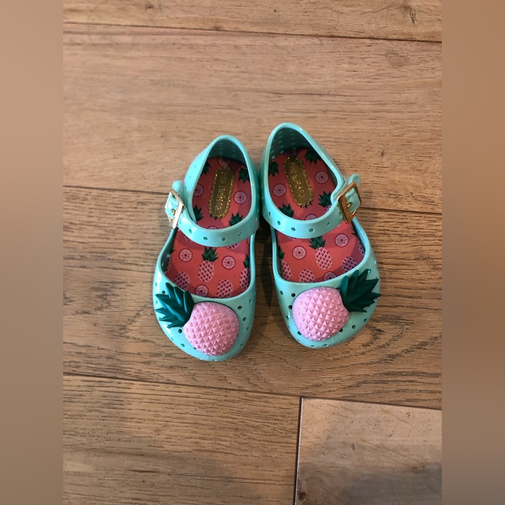 Mini Melissa toddler pineapple sandals.